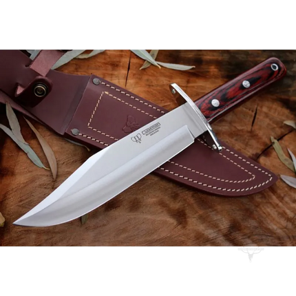 This knife features a 25cm blade and a polished red stamin wood handle, making it a reliable tool for various outdoor activities.